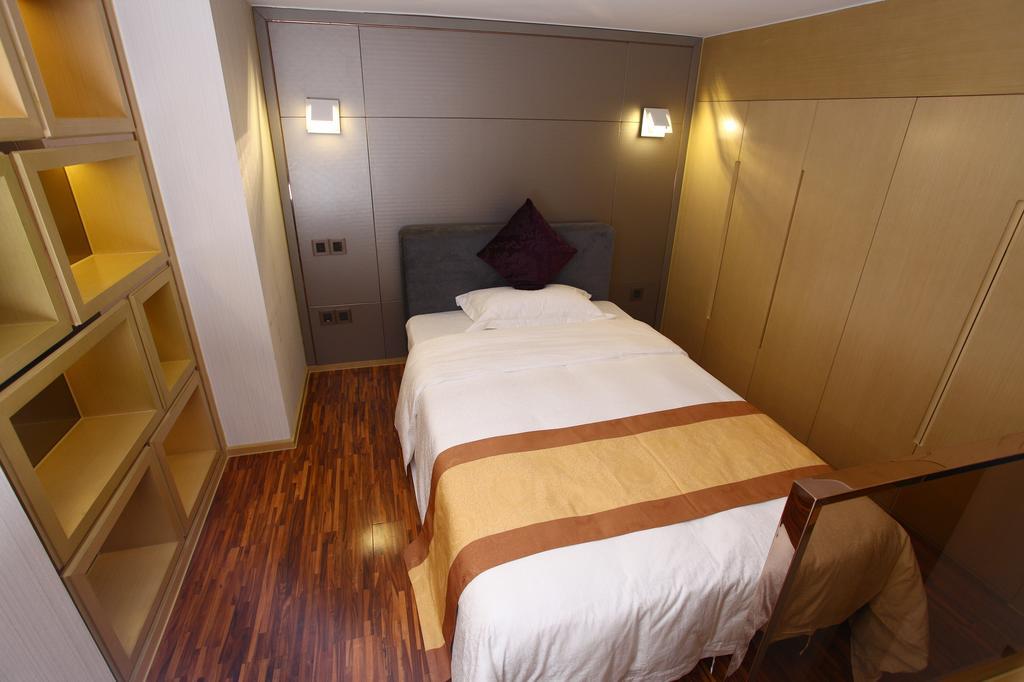 Heefun Apartment Hotel Guangzhou - Poly D Plaza Branch Habitación foto